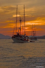 Triad Coming into Port at Sunset